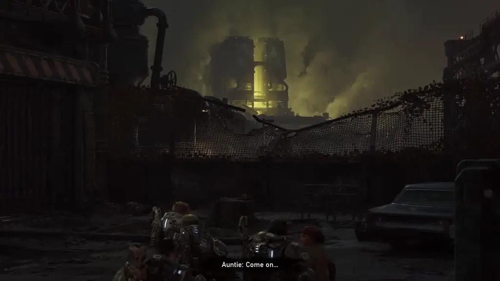 The glowing Timgad Refinery seen over a fence