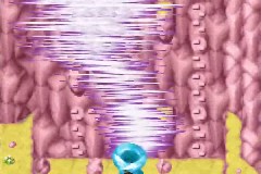 A giant whirlwind sweeping up the cliff