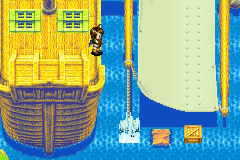 The crate knocked off the sail into the water