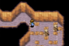 The two boulders blocking the corridor