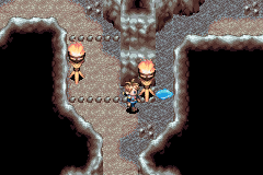 Bilibin Cave room with two torches and an ice pillar
